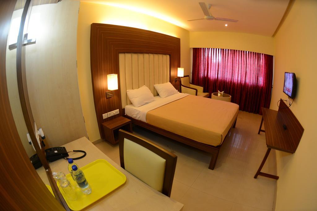 Hotel Ayush International Mangalúr Pokoj fotografie